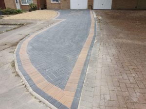New Driveway With Block Paving and Extended Area For Parking With Permeable Gravel