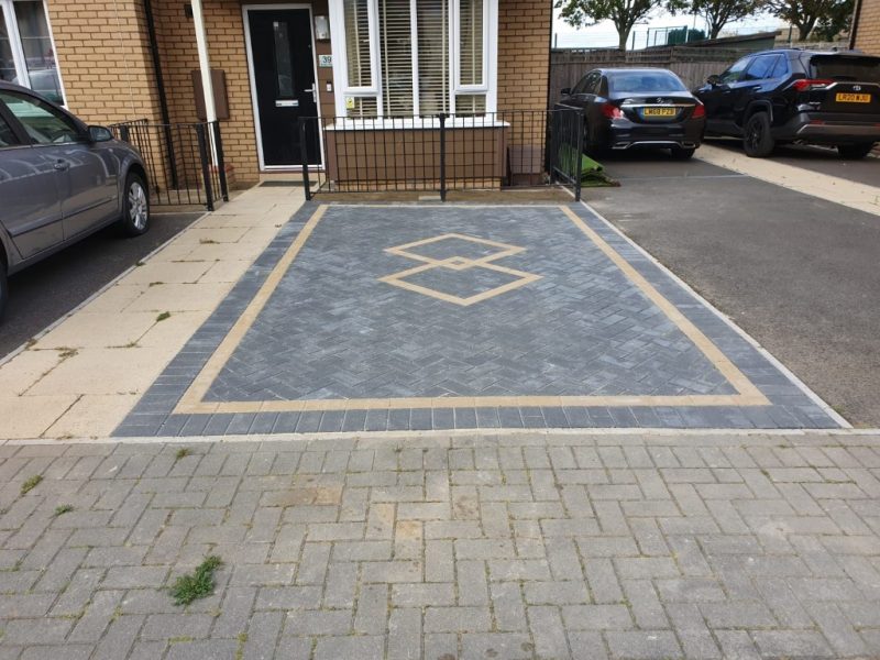 Charcoal Block Paving Driveway with an Insert in Milton Keynes